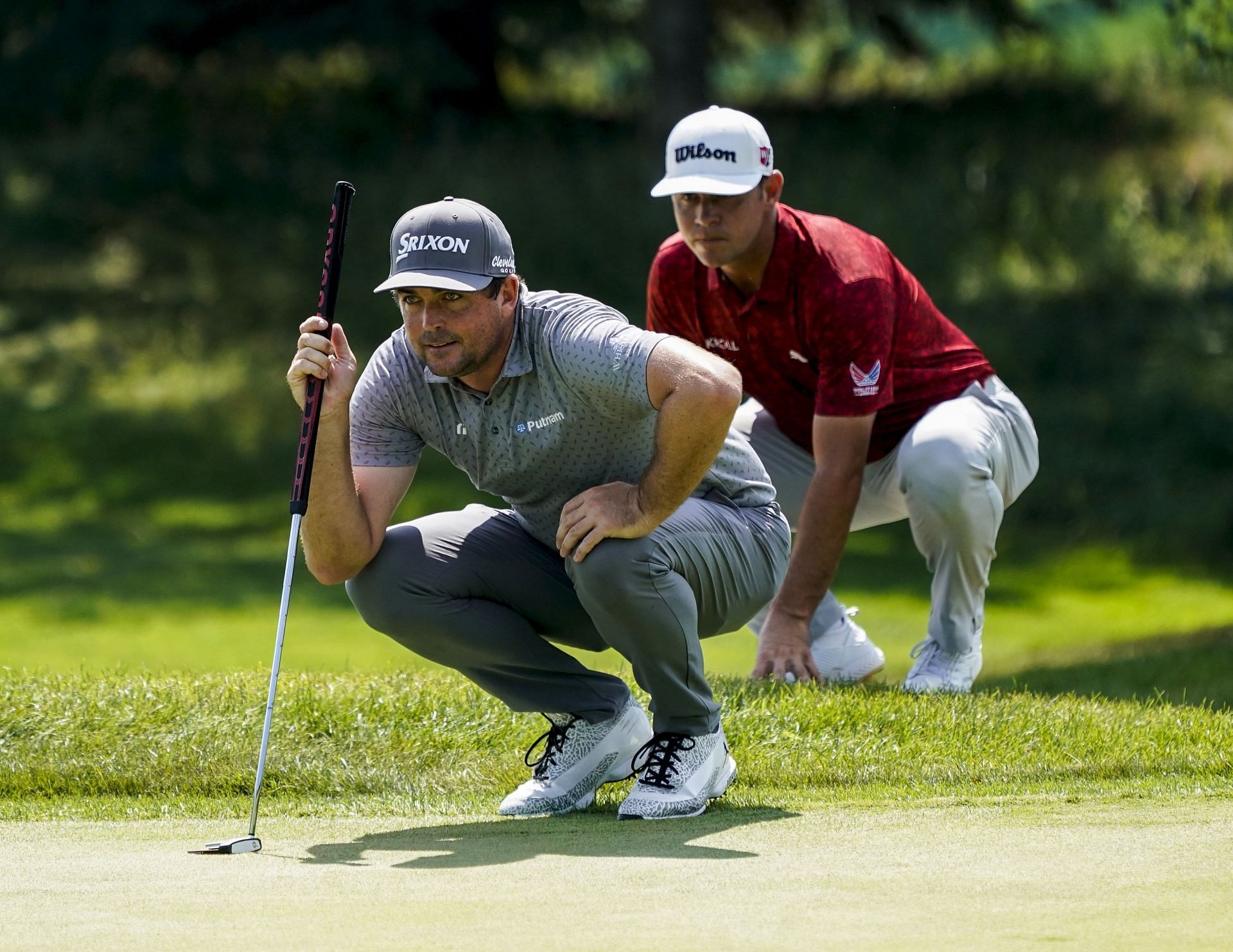 Keegan Bradley and Gary Woodland behind him (Image source: Getty)